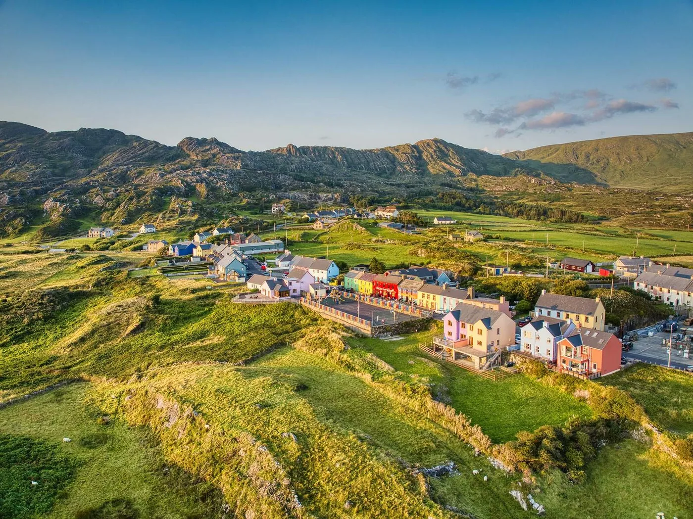 Colourful Allihies village nestled among the green hills of the Beara Peninsula